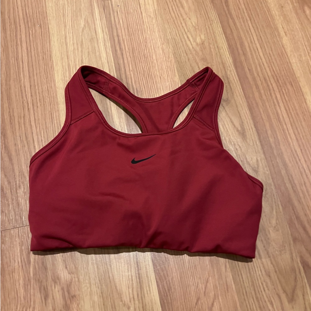 Pair of Nike padded sports bras